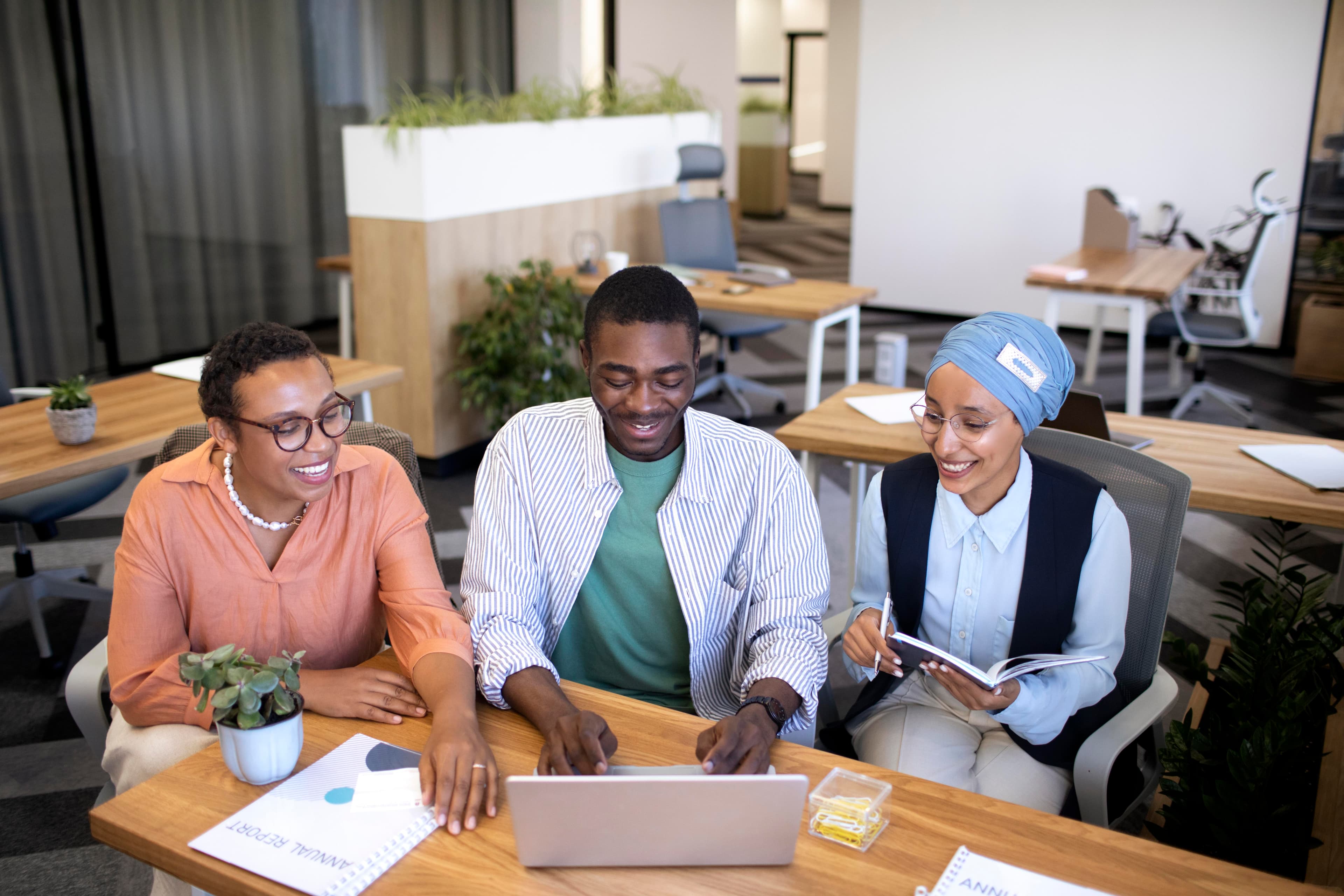 Leadership team collaborating in a modern office