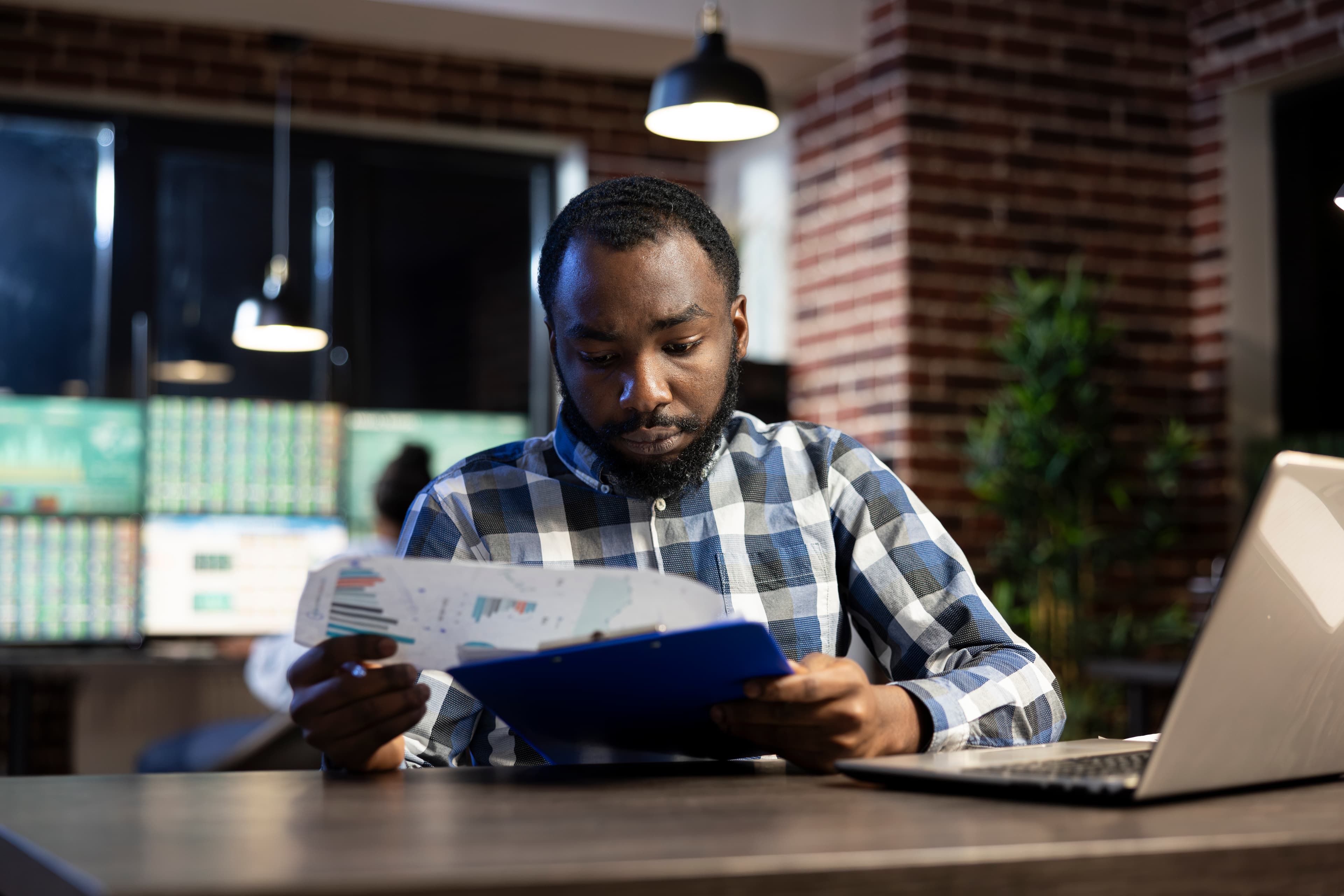 Business owner reviewing financial reports