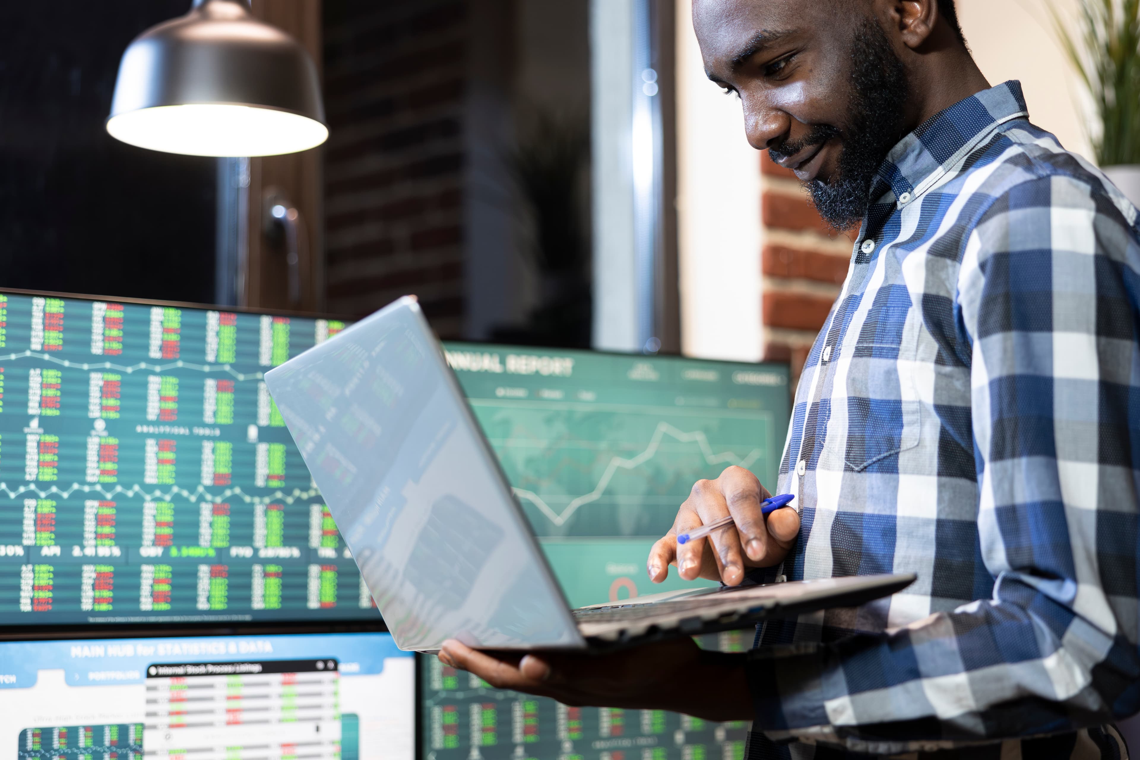 Sales professional tracking deals on a laptop